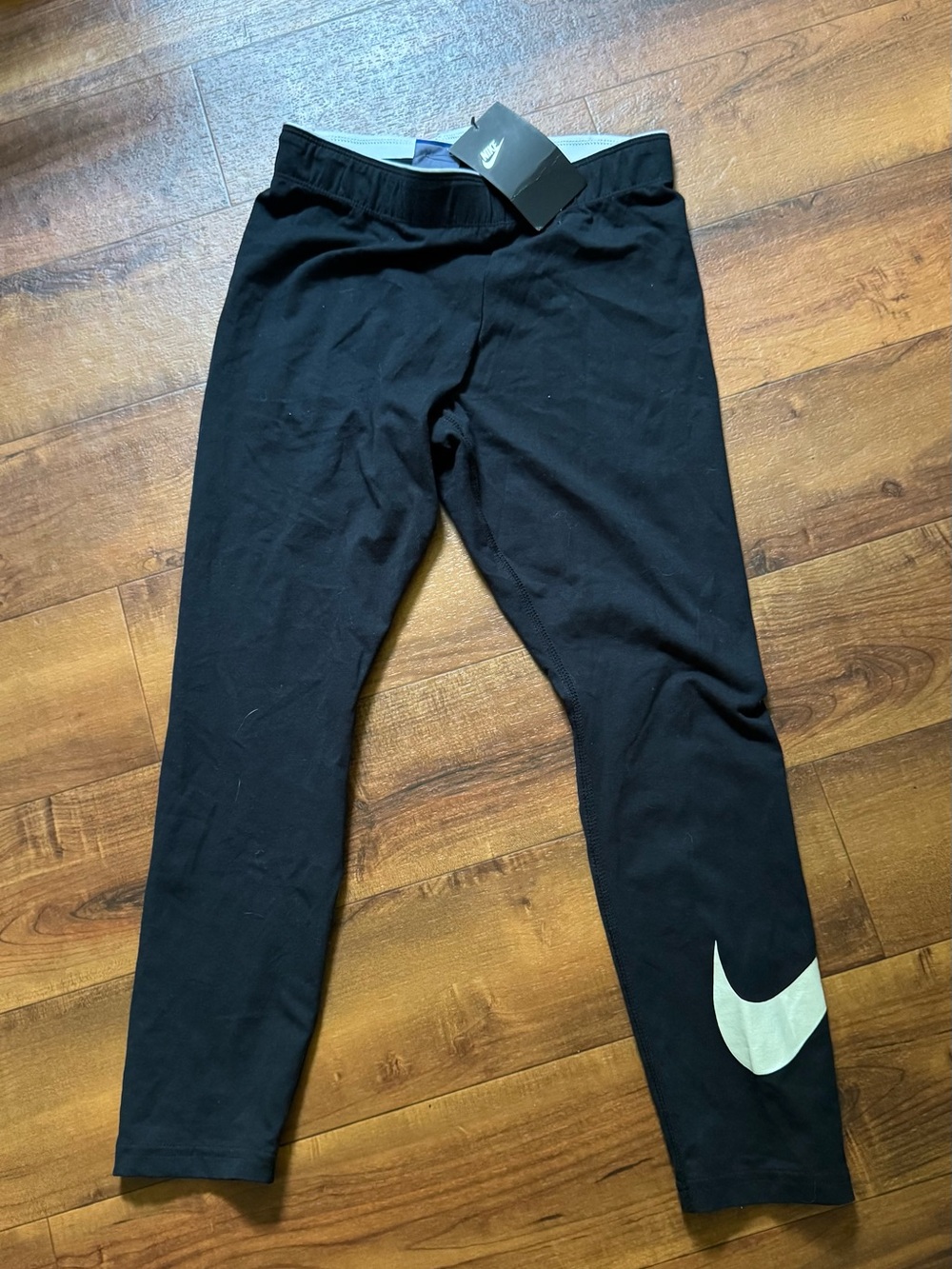 Nike Black Leggings with White Swoosh Accent